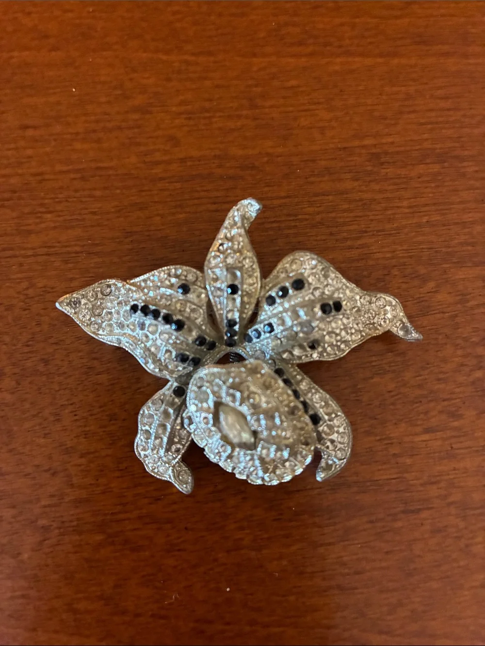 Nolan Miller vintage/antique Silver Rhinestone Floral Brooch with Black Accents